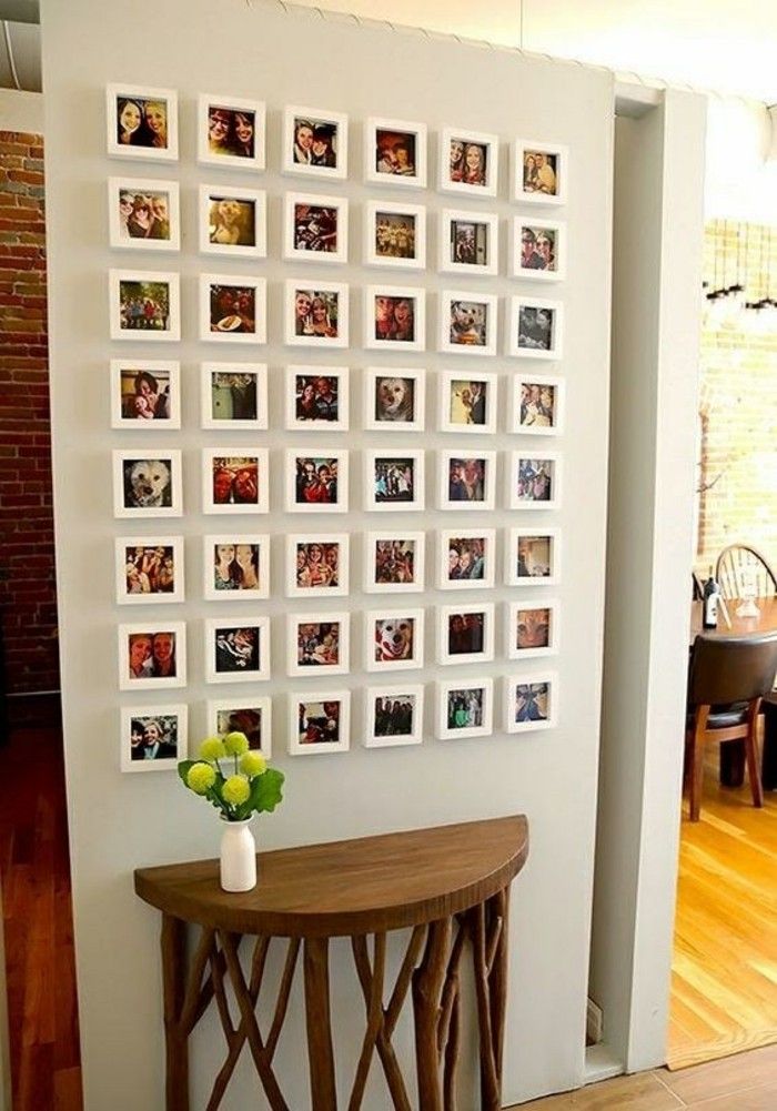 11-cornice-muro-di-foto-fiori-tavolo-di-legno-as-vaso