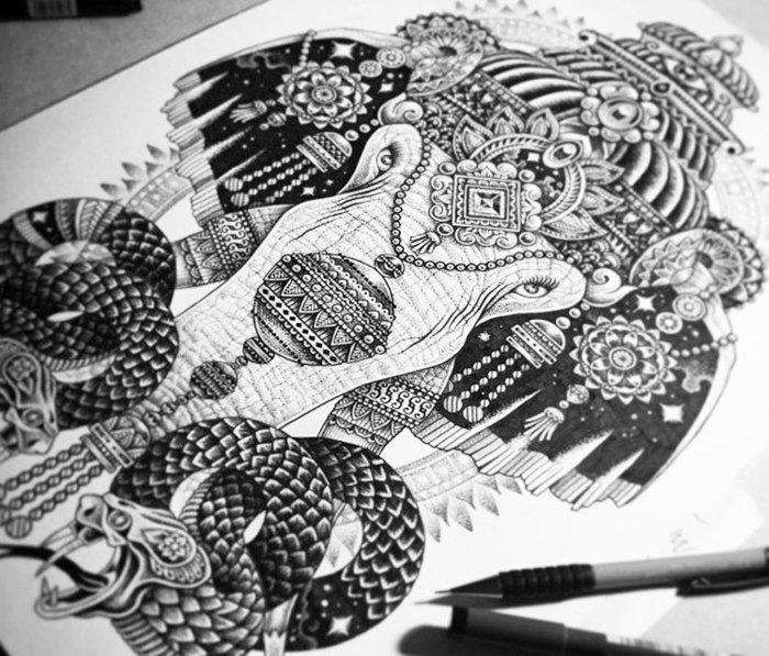 liten mandalas, integrerad i en svartvitt ritning, elefantteckning med två ormar