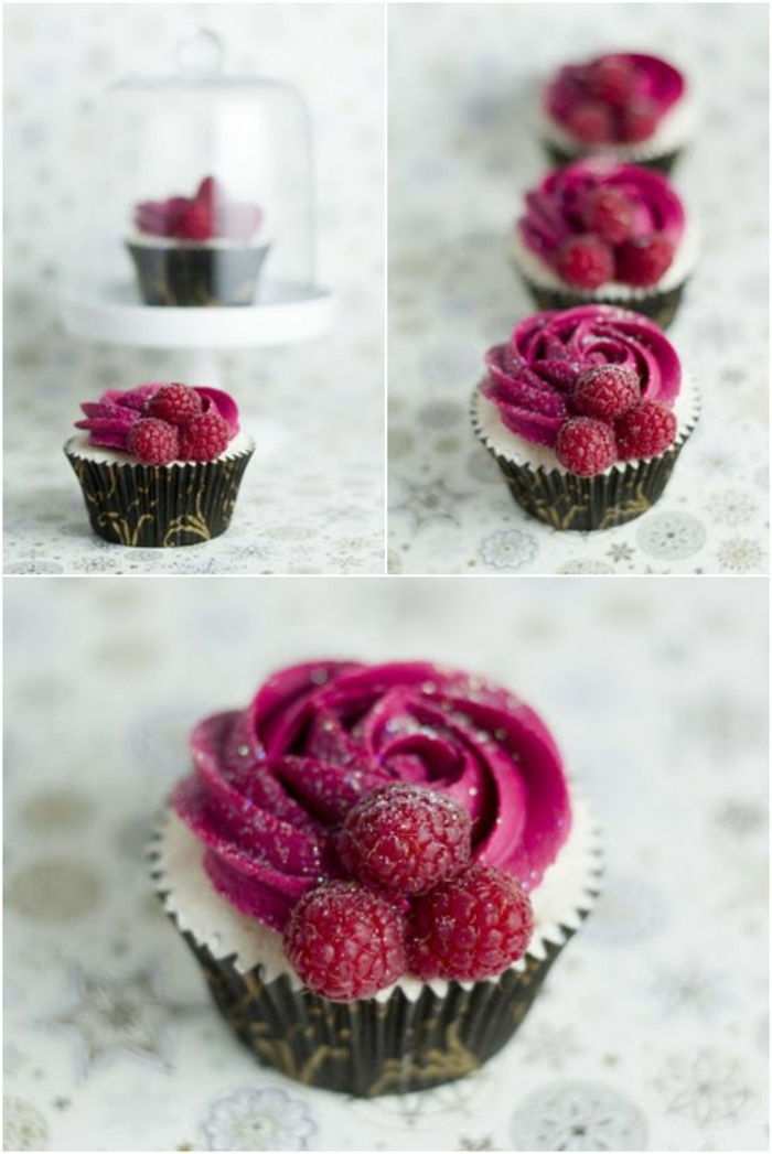 dekorere cupcakes med rosa krem ​​og bringebær