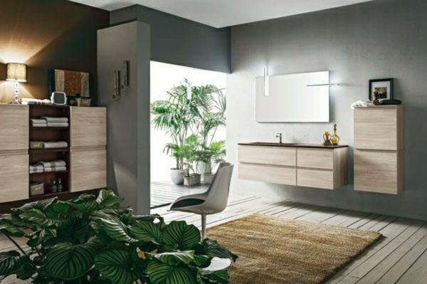 Moderná obývacia izba - zelené rastliny a hnedý nábytok
