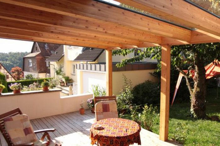 Zadaszenie drewniany balkon konstrukcja własna okrągły stół