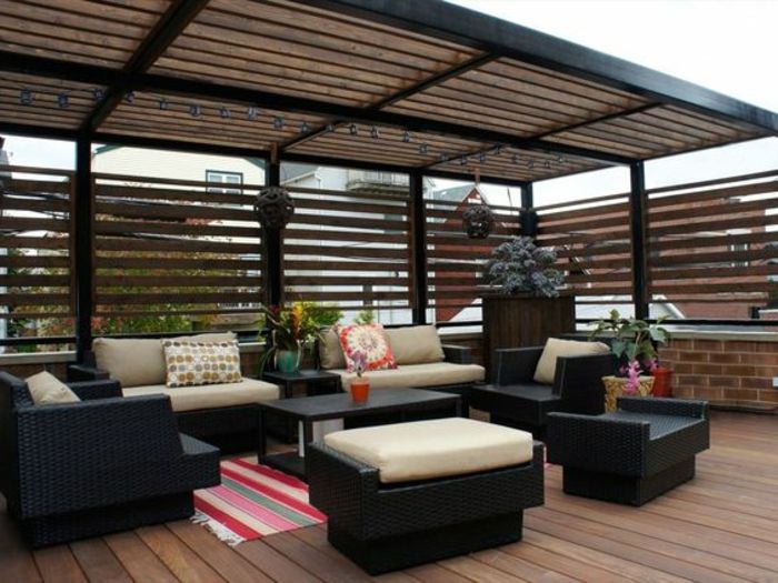 Takläggning balkong lounge svit modern mattan deco kudde