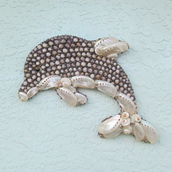 Deco s-Musheln Delfini na steno
