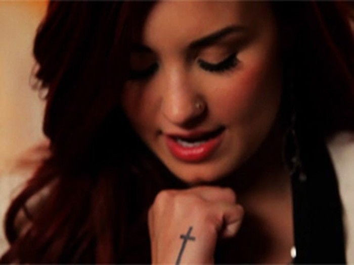 Demi Lovato--Cool Cross Tattoo