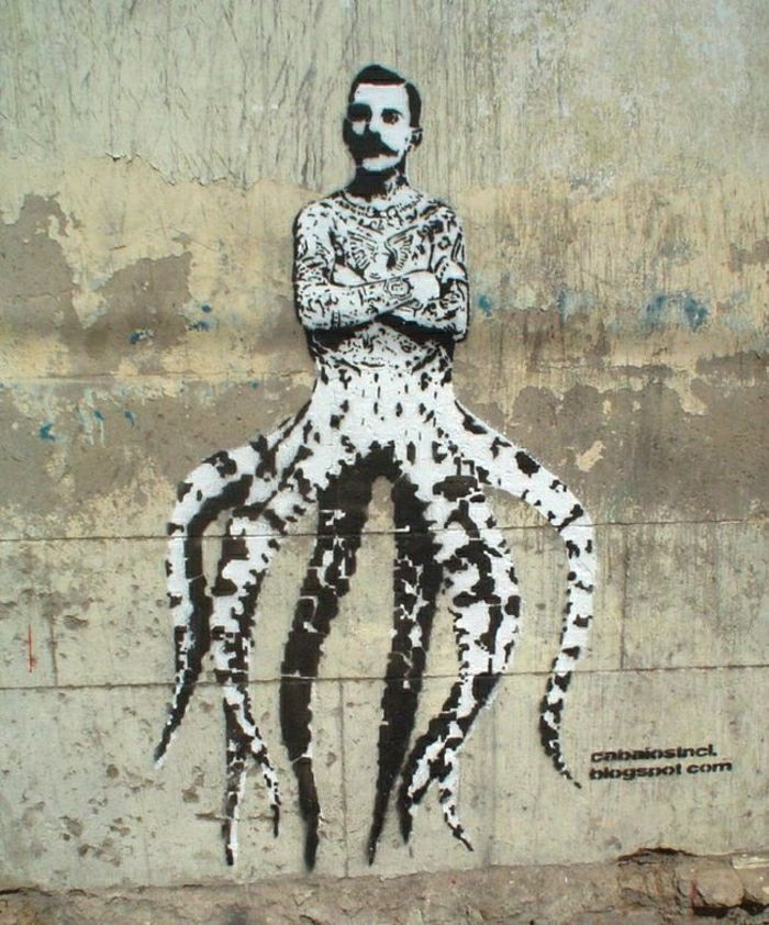 Graffiti steet-art Freddie Mercury ośmiornica-zabawny żart