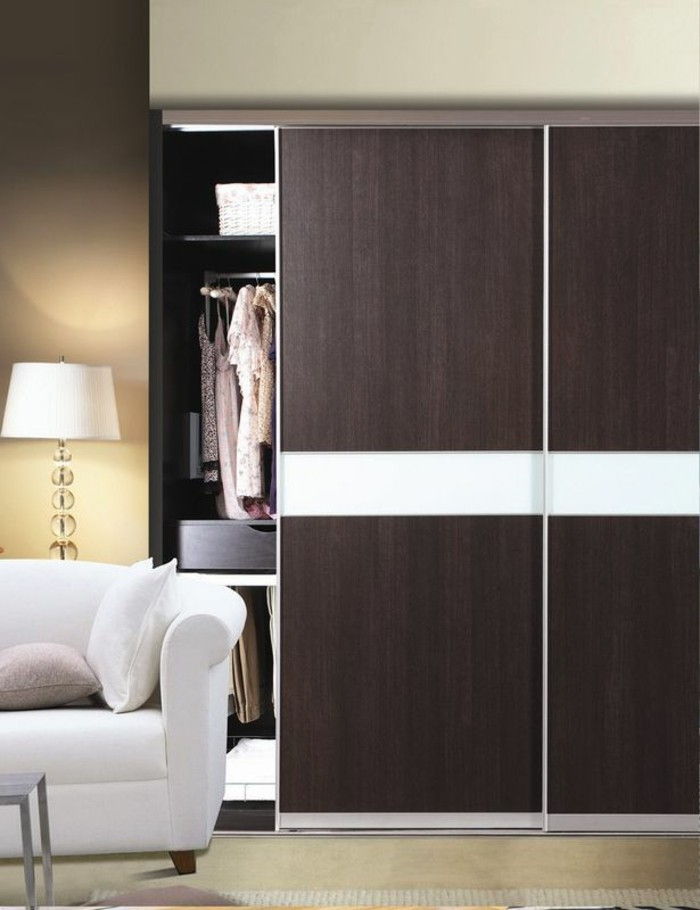 porte-proprio-build-in-marrone-colore-per-dame-in-living room scorrevoli
