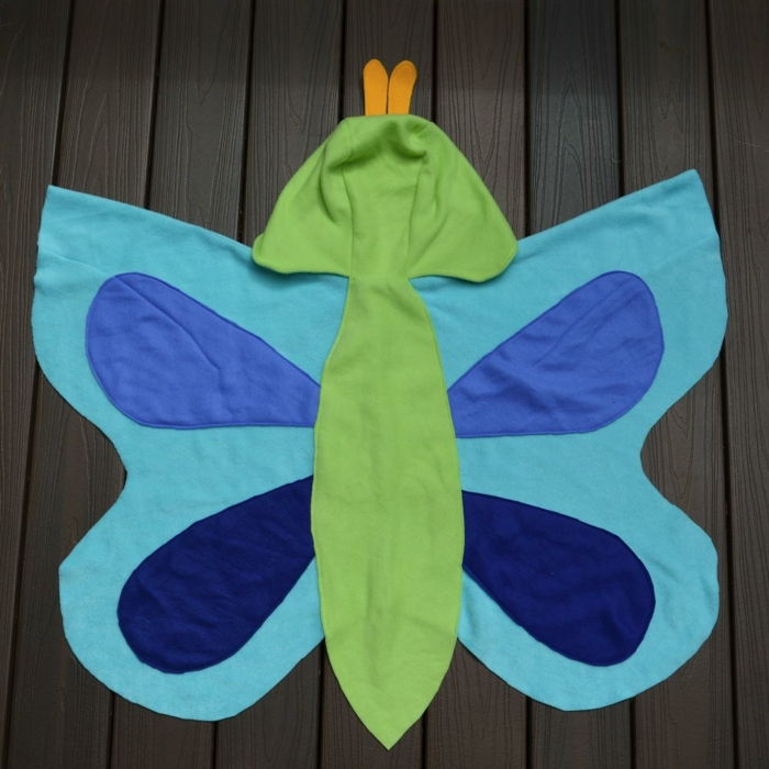 Fjärilar-tinker-med-barn-en filt