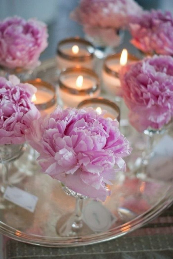 Bordsdekoration rosa blomma ljus