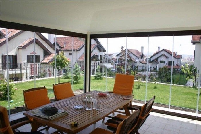 veranda-konservatoriet-med-view-on-bakgård-big-table-of-hozl