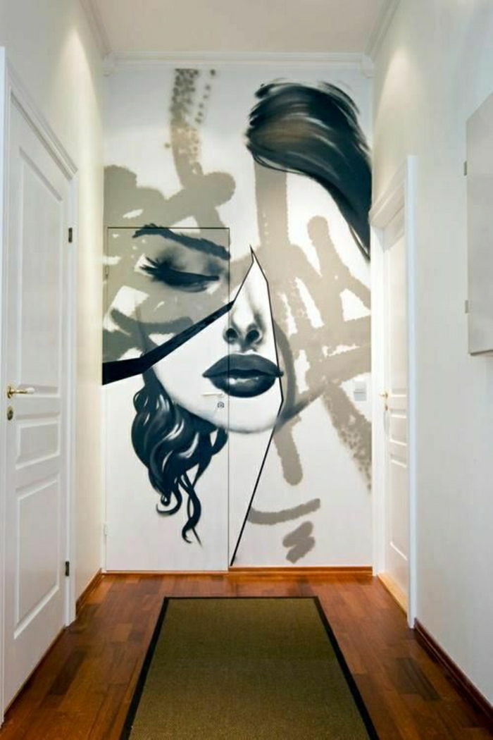 Platt-vita dörrar graffiti kvinnligt ansikte svart och vitt konst