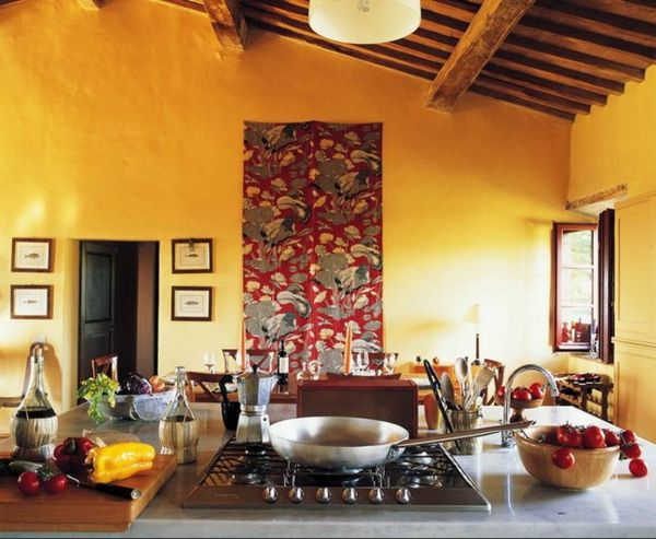 kuchnia adriano bacchella - kolor pomarańczowy i akcent na ścianie