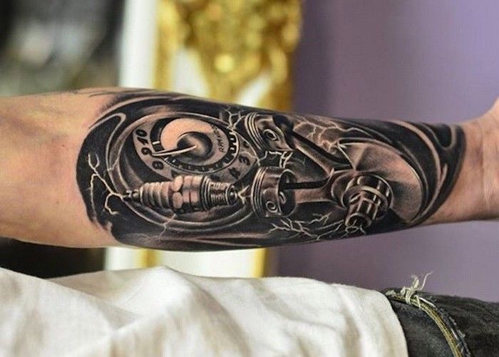 arm tattoo man, 3D-tattoo in zwart en grijs op zijn onderarm