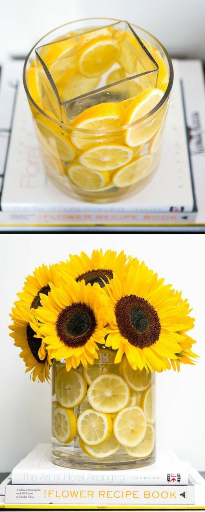 Stiklo vazos, papuoštos citrinos žievelėmis, geltonos gėlės, saulėgrąžomis