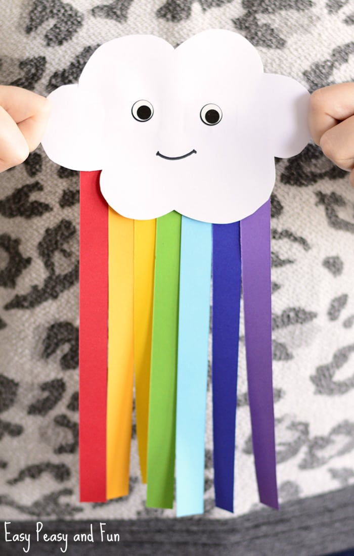 Skärande idéer för småbarn, moln och regnbåge från papper, teckning av ansikte