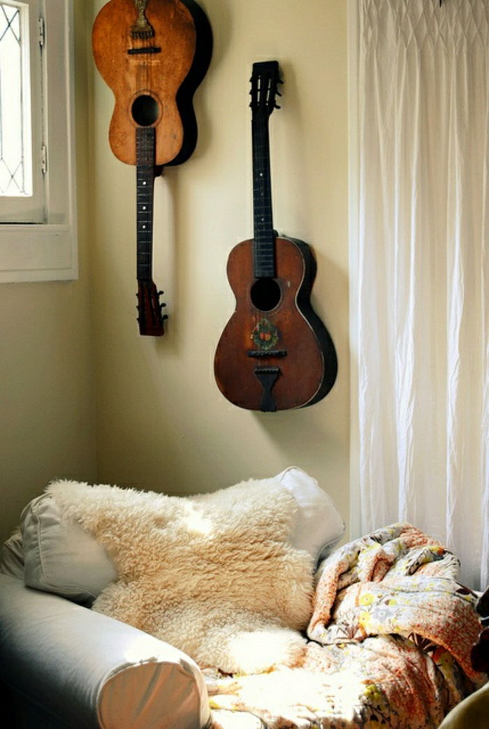 confortável cadeira Fur cobertor Recreação acústicos guitarras-an-der-wall