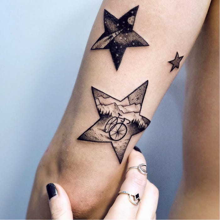Tatuiruočių menininko tatuiruočių menininkas yra tikrasis menininkas - žvaigždės su nuotraukomis joje - tatuiruočių stiliai