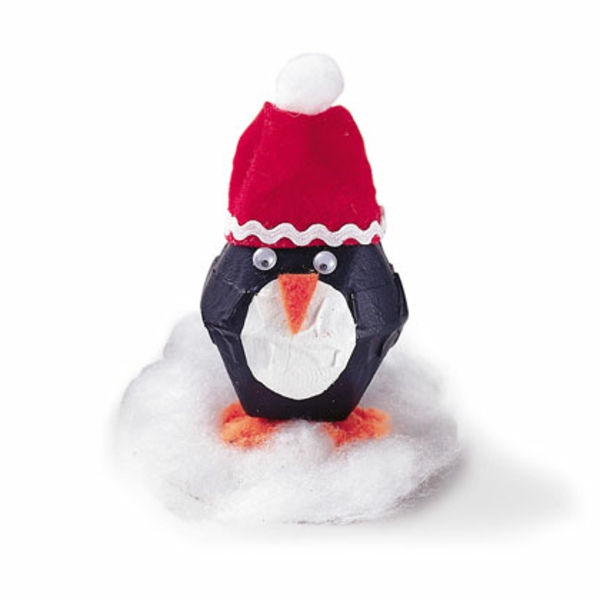 obrti ideje za vrtec - papirni pingvin z rdečim pokrovčkom