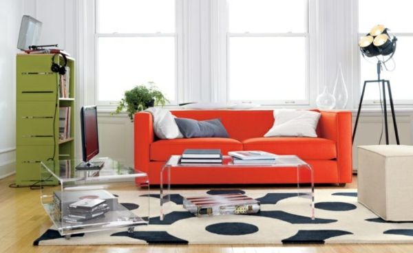chladný-obývacia izba-s-a-červená pohovka-and-a-akrylový stolík