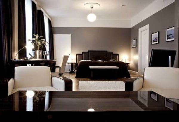 artdeco stil - elegant sovrum med två vita fåtöljer