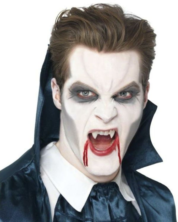 en man vampyr ansikte smink bakgrund i vitt