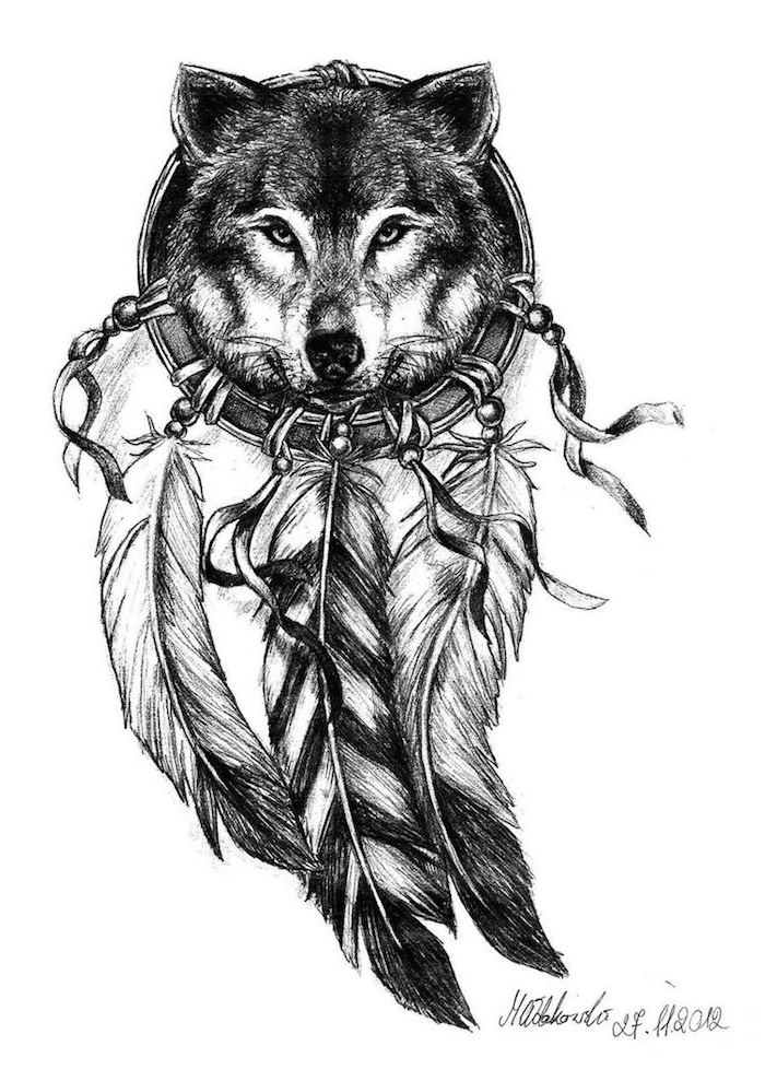 to je jeden z našich nápadov na tetovanie s čiernym drmcatcher s dlhým perím a čierny krásny vlk
