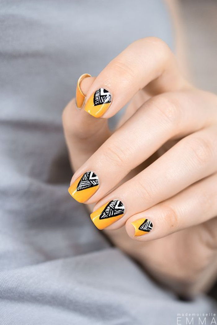 gul neglelakk, svart dekorasjon, sommerideer for vakre negler