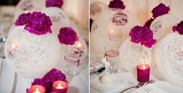 dekorowanie sprężyny drucianej. kule nici z fioletowymi kwiatami, dekoracja stołu, świece