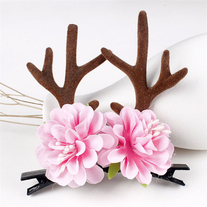 frisyre ideer kreativt hår ornament hårklipp med rosa blomster og elg horn