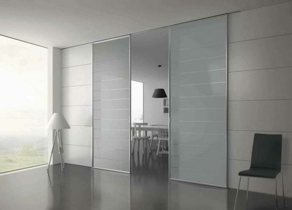 glidande glasdörr vit rum design modern idé