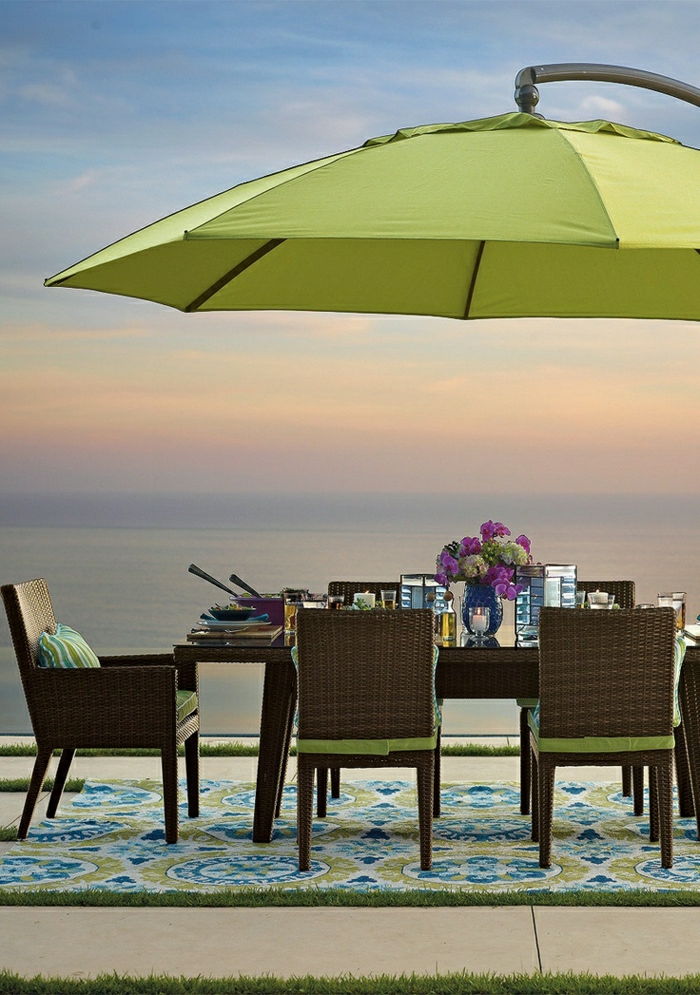 grønn hage paraply bord stoler Rattan Flower Sea Sunset