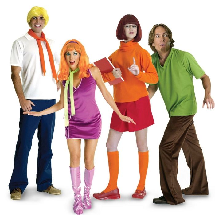 Grupo de fantasias de Scooby Doo sem o cachorro de dois meninos e duas meninas