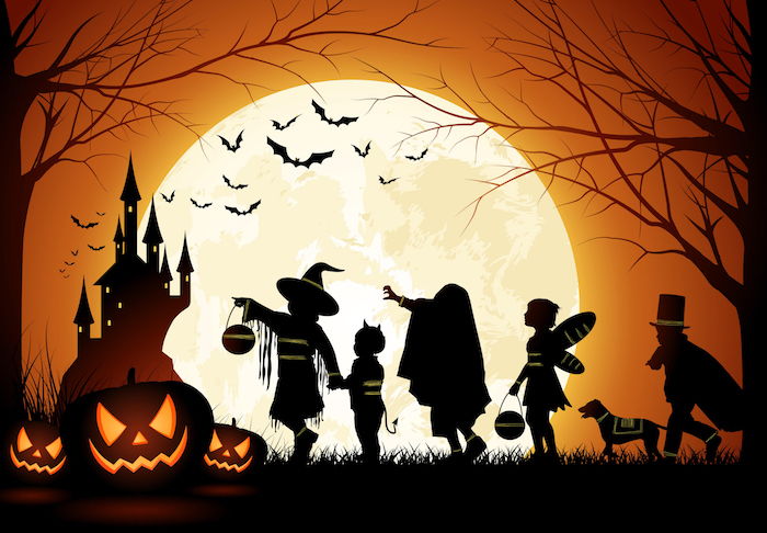 Noč čarovnic slike nekaj otrok v kostumi Halloween, polna luna in netopirji