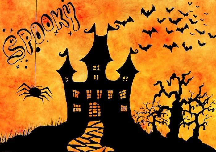 halloweenský hrad s nápisom Strašidelný a pavúk - obrázky Halloweenu