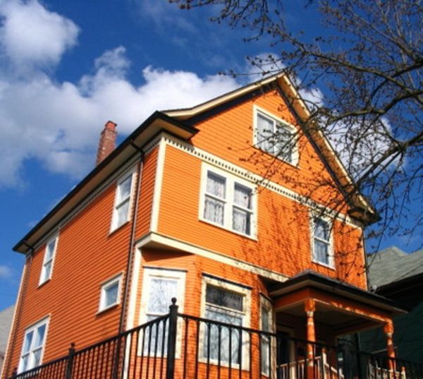 hausfassade-färg vacker-house-in-orange-designade