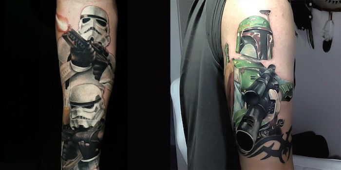 Două mâini cu tatuaje ale războaielor de stele, cu un robot verde și două clone albe mari