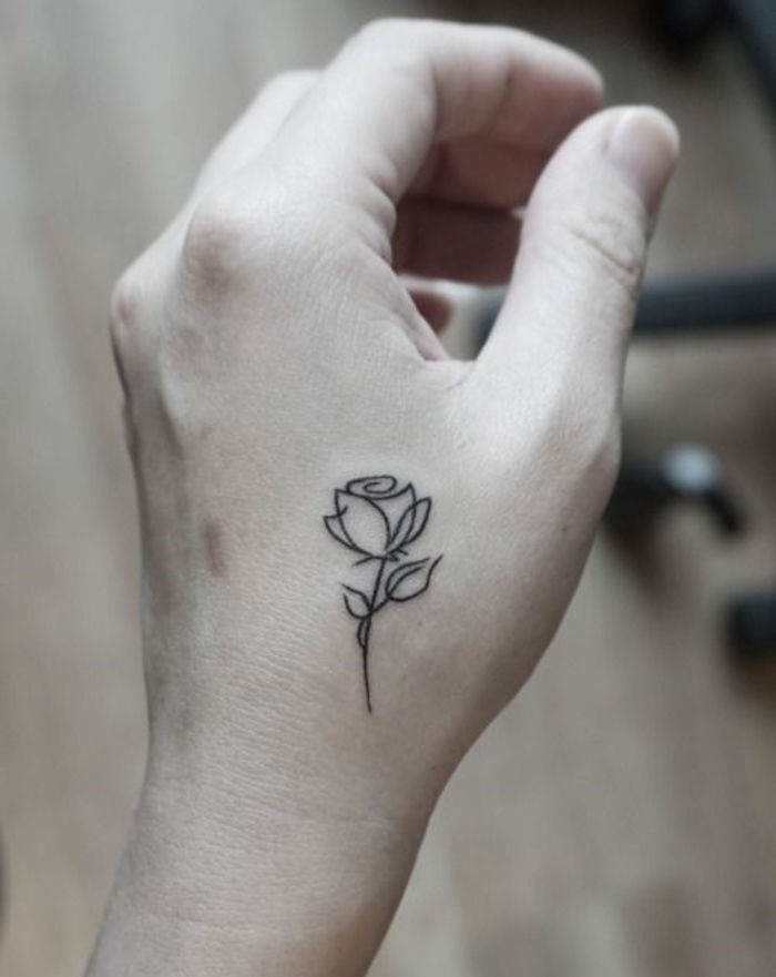 szablon tatuaży róż - pomysł na mały tatuaż na dłoni - mała biała róża