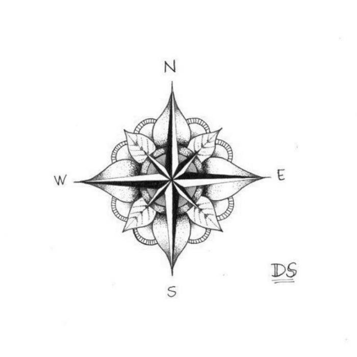 cvetje, bele liste in majhno črno kompassko idejo za majhno elegantno tattoo kompas