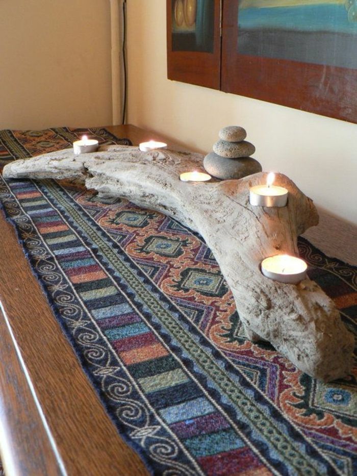 medžio dekoras lauko medienai kaip žvakių stendas naudoja gražią spalvingą kilimų dizaino idėją