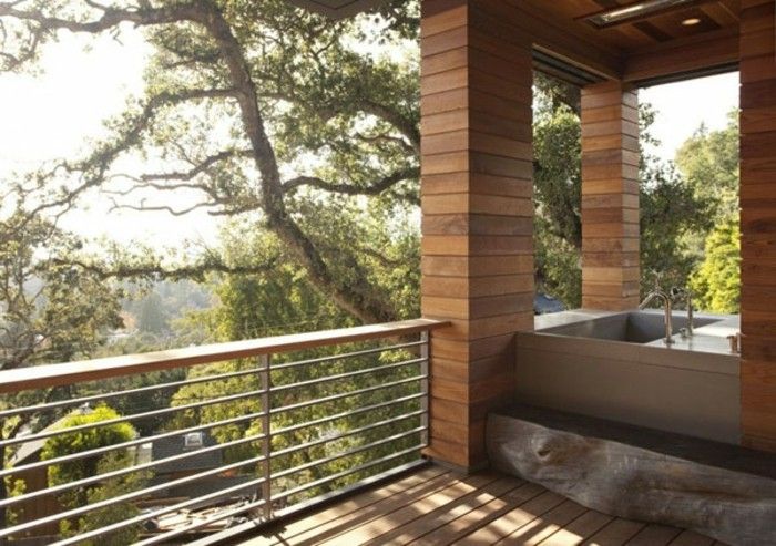 lemn-casa-cu-verandă însorită-și reinvitarea