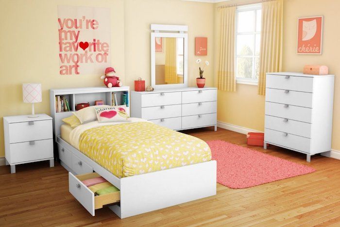 tiener kamer creatieve mode oranje en rood liefde opschrift boven bed bed met laden voor de was