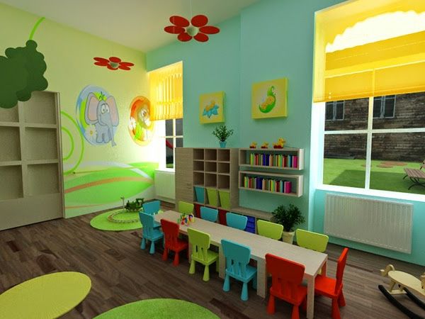 przedszkole-wnętrza-pra-stół-z różnobarwnych krzesełka