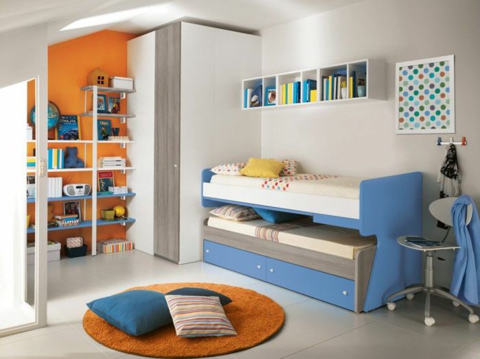 idei frumoase pentru copii cameră rotundă covor cu perne decorate pat culori perete portocaliu în cameră