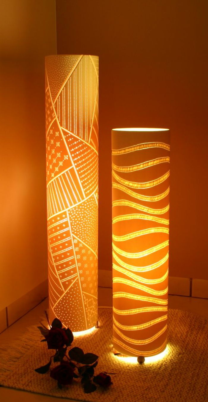 veľké papierové lampy zdobené geometrickými figúrkami