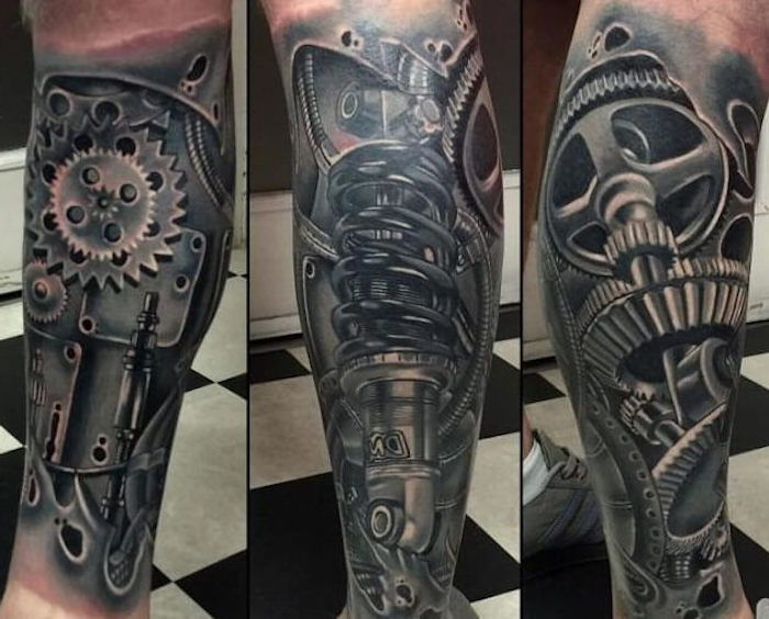 Heren tatoeages, grote zwarte en grijze tatoeage met machineonderdelen