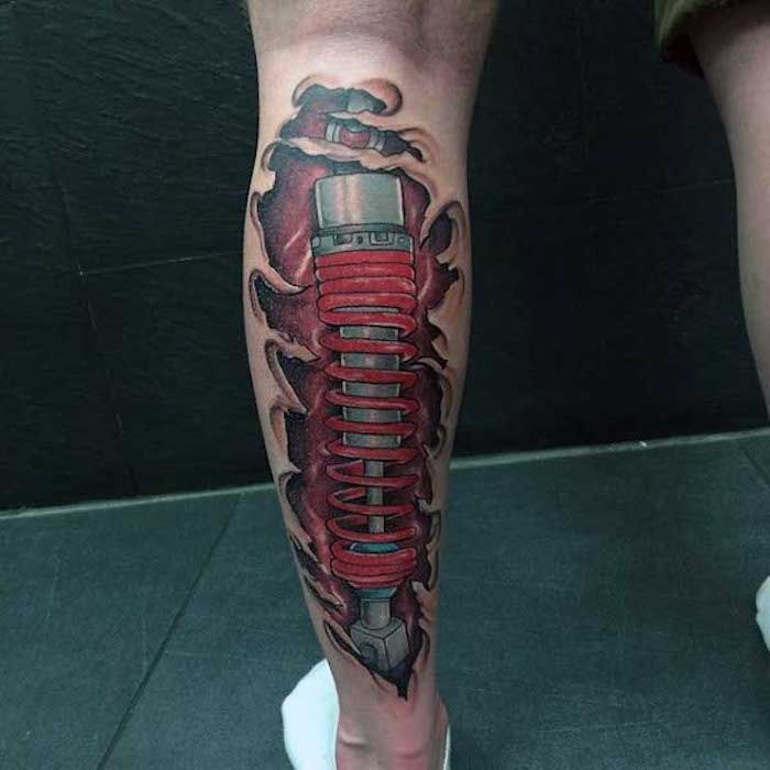 Heren tatoeages, vurige tatoeage op het been, robot tatoeage