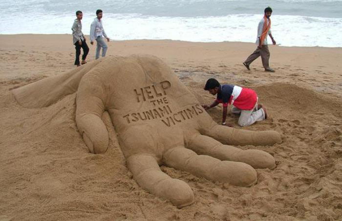 moderne skulpturer-of-sand-sosialt budskap