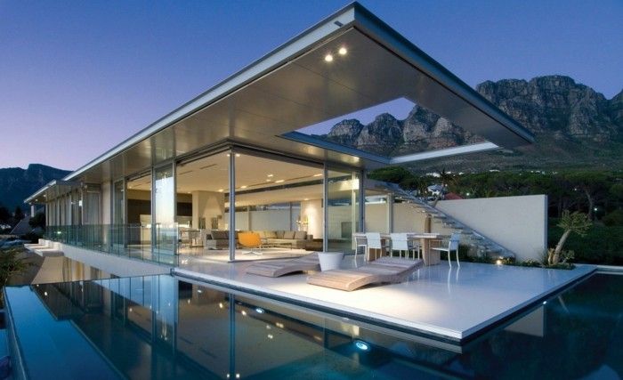 modernus-architektas namas-minimalistinio modelis-kūrybinis dizainas-aplinka-ir-vandens