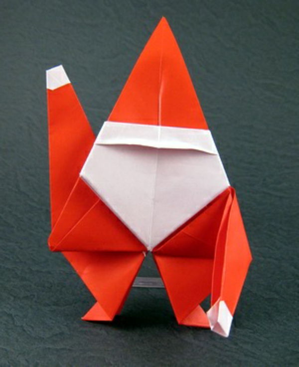 origami-till-jul-söt-santa-man - bakgrund i grå färg