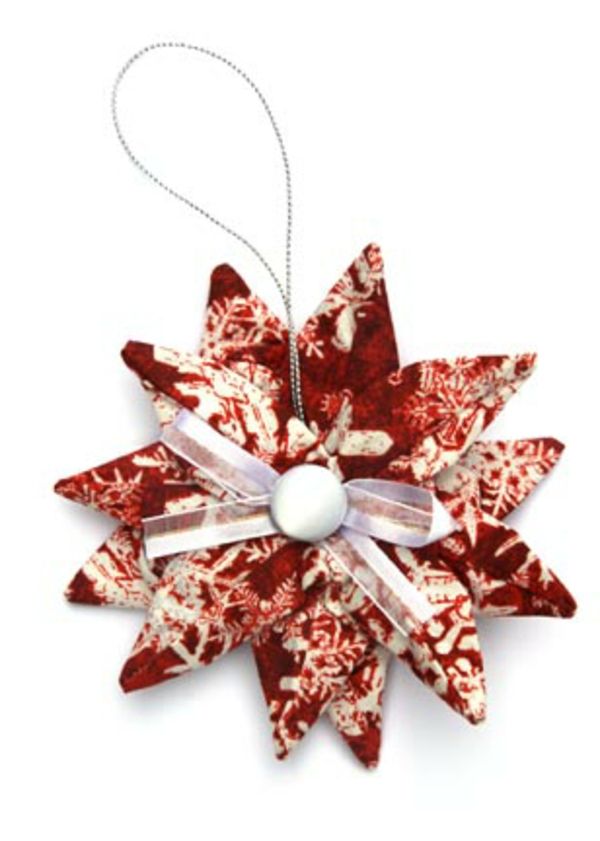 origami-till-jul-vacker stjärna - bakgrund i vitt