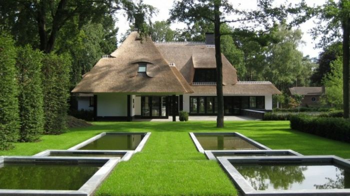 ett vackert hus i Sylt med en modern minimalistisk trädgård